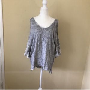 Free people sweatshirt with cold shoulder.